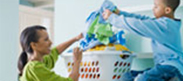 woman and child doing laundry