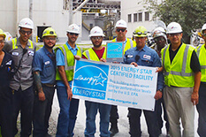 Cement plant workers holding ENERGY STAR sign