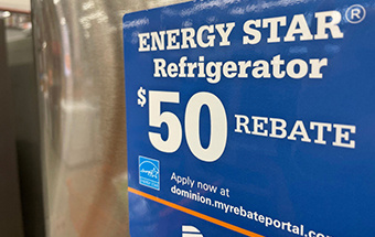 Sticker on a refrigerator promoting a rebate